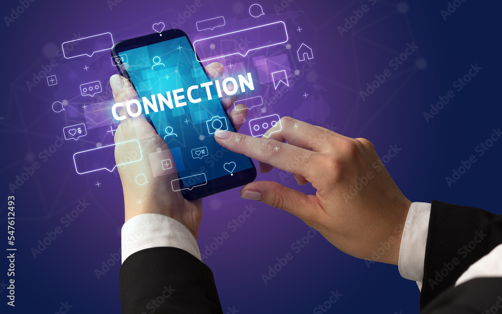 Hand using smartphone with social media concept Hand using smartphone with social media concept