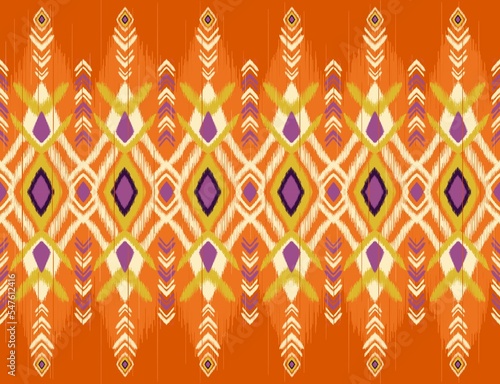 Colorful ethnic pattern. Illustration colorful yellow ethnic aztec boho ikat style seamless pattern background. Ethnic Navajo pattern for fabric, textile, home decoration elements, upholstery.