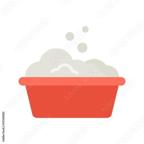 Plastic basin with soap suds. Washing clothes, cleaning equipment.