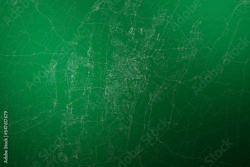 Map of the streets of Chongqing (China) made with white lines on abstract green background lit by two lights. Top view. 3d render, illustration