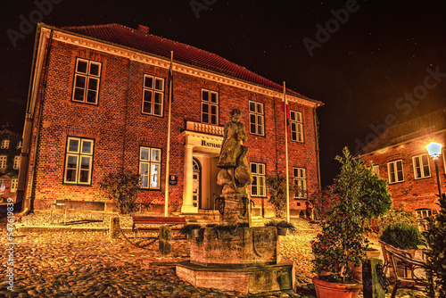 rathaus mit springbrunnen in plön  photo