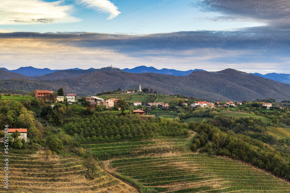  Landscape of Solovenian vineyards, hills and mountains in autumn. Šmartno, Brda Goriska region, Slovenia.