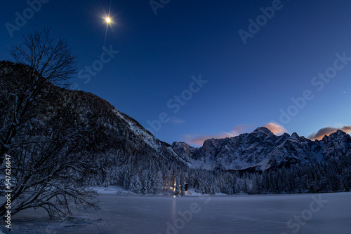 Winter moonlight on the lakes of Fusine