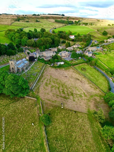 Bird's eye view of Bradfield village in a green field in Berkshire, England photo