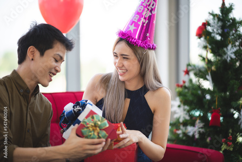 Cheerful young couple celeb...