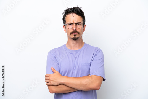 Young man with moustache isolated on white background feeling upset