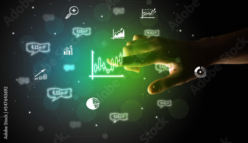 Businessman finger touching on screen multimedia interface with hand drawn currency icons