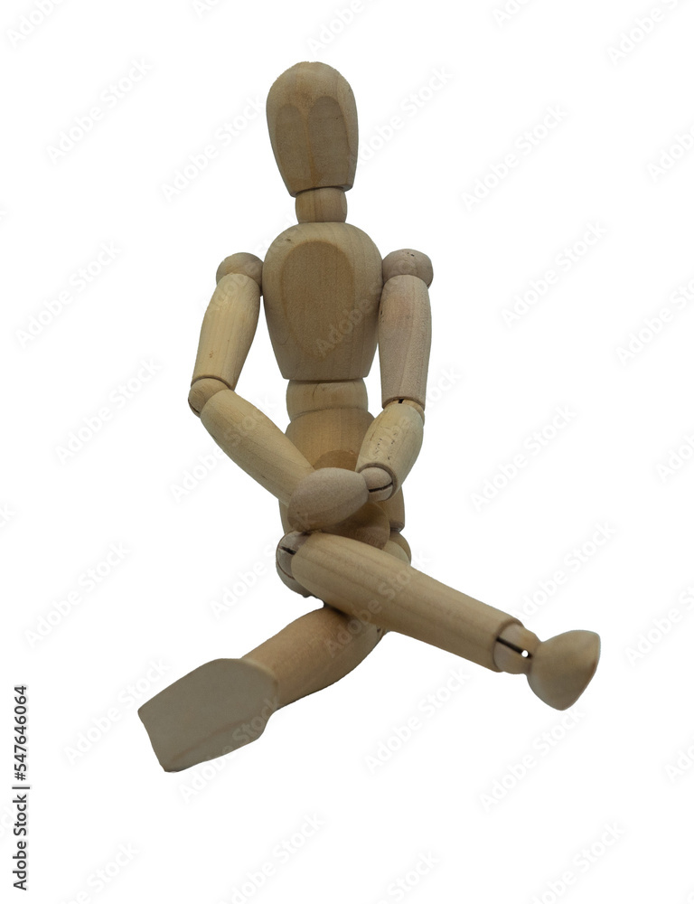 Wooden jointed figure sitting on ground with legs crossed and hands on lap Wooden jointed figure sitting on ground with legs crossed and hands on lap