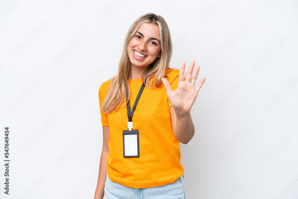 Young caucasian woman with ID card isolated on white background counting five with fingers Young caucasian woman with ID card isolated on white background counting five with fingers
