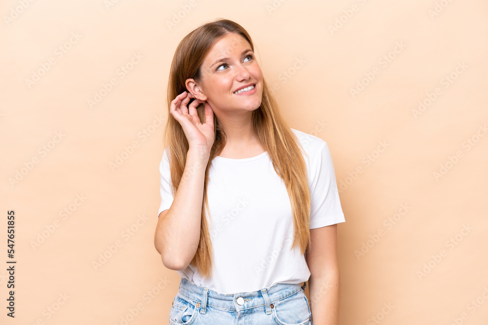 Young caucasian woman isolated on beige background thinking an idea Young caucasian woman isolated on beige background thinking an idea