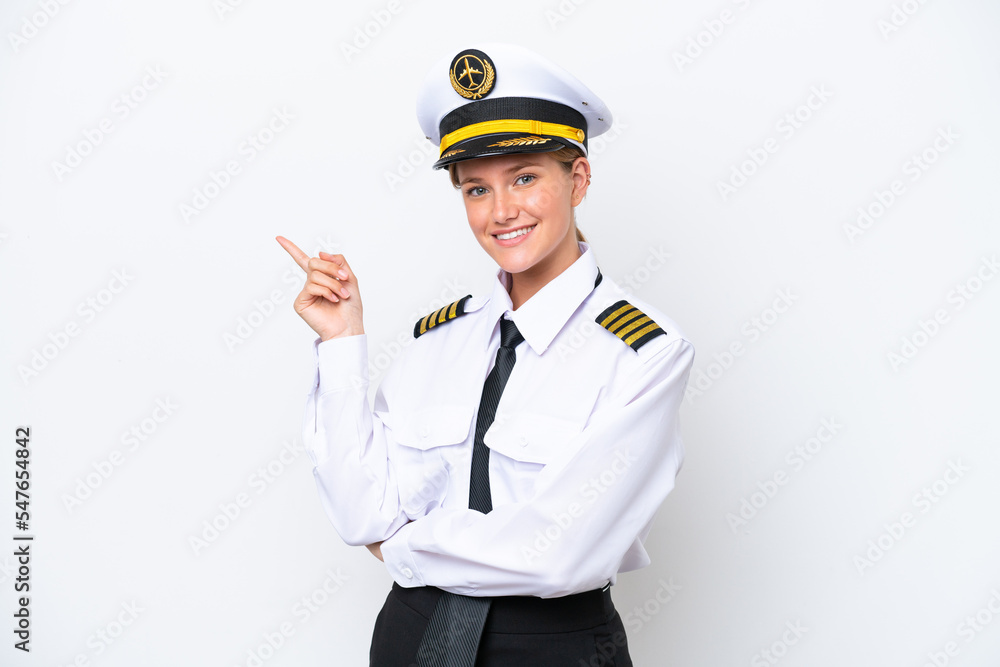 Airplane caucasian pilot woman isolated on white background pointing finger to the side Airplane caucasian pilot woman isolated on white background pointing finger to the side