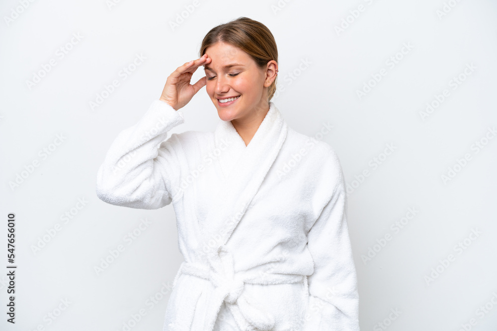 Young pretty blonde woman in bathrobe isolated on white background smiling a lot Young pretty blonde woman in bathrobe isolated on white background smiling a lot