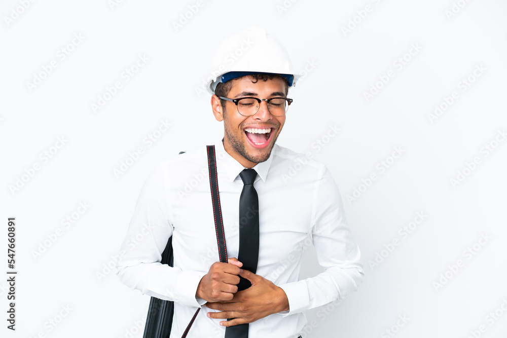 Architect brazilian man with helmet and holding blueprints smiling a lot Architect brazilian man with helmet and holding blueprints smiling a lot