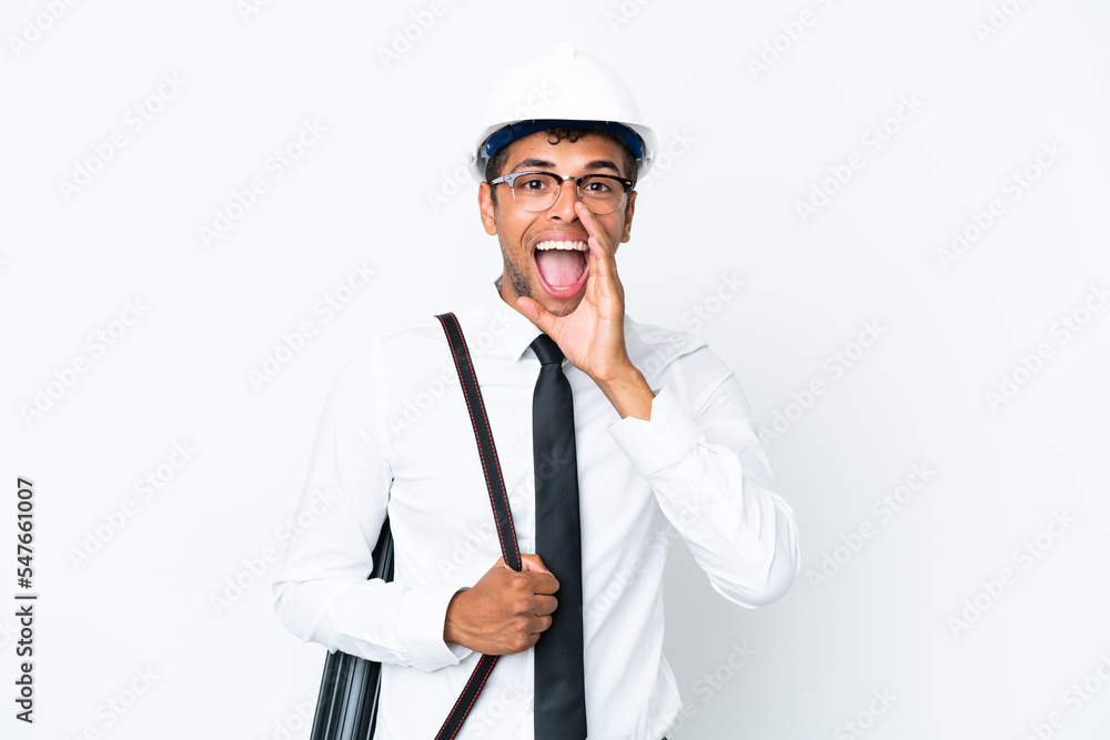 Architect brazilian man with helmet and holding blueprints shouting with mouth wide open