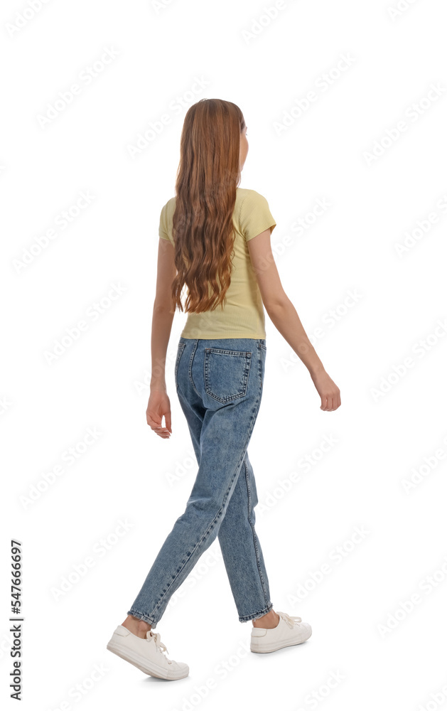 Young woman in casual outfit walking on white background Young woman in casual outfit walking on white background