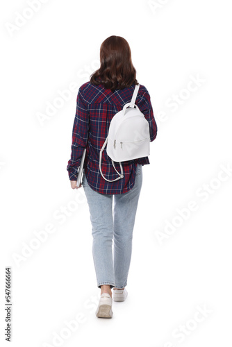 Woman with stylish backpack walking on white background, back view