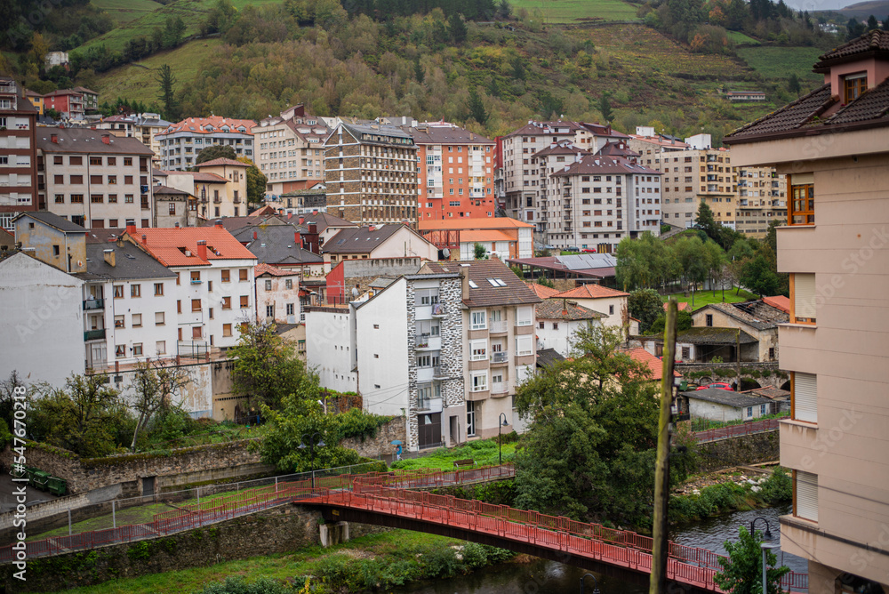 City in the middle of the forest between mountains City in the middle of the forest between mountains
