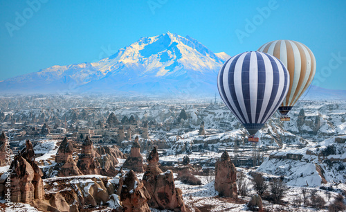 Hot air balloon flying over Cappadocia, next to erciyes mountain