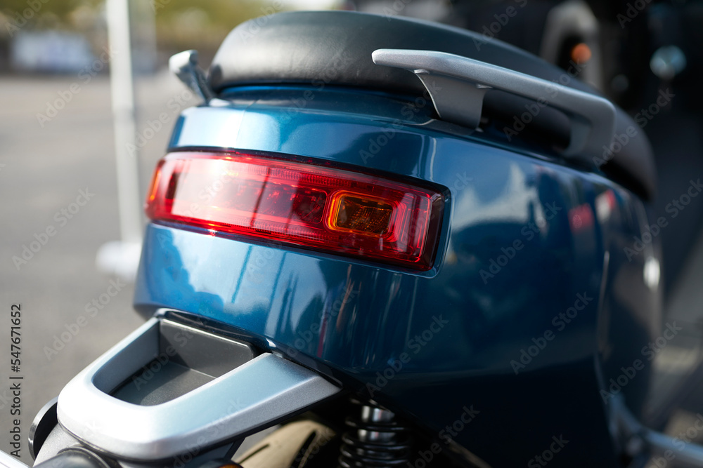 Fototapeta premium electric motorcycle in the street . back view