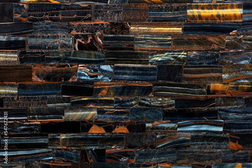 Tiger Eye Blue slab. Precious mineral quartz pattern. Exclusive luxury gemstone background. Natural semi precious stone texture. Material, background for unique interior, exterior design decoration.