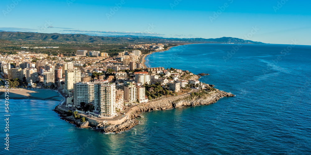Coastal Panorama view of Oropesa del Mar, Spain, showing blue water, cliffs
