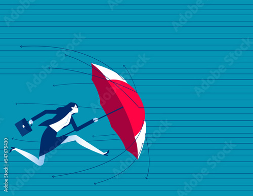 Holding umbrella to cover and protect from downturn arrow. Protechtion stock in economy crisis