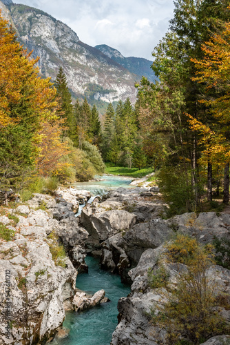 The Soca river flowing through a wild mountain landscape of the Julian Alps in Slovenia