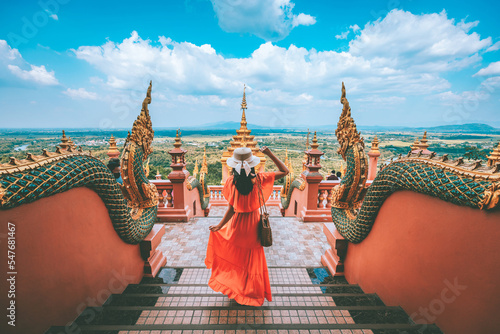 Konstfotografi Traveler asian woman with dress travel in temple at Lampang Thailand