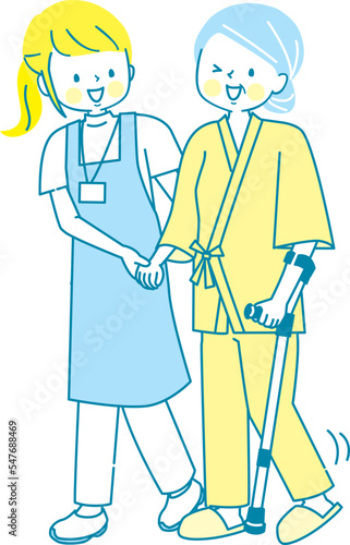シニア女性を介助する若い介護士のイラスト