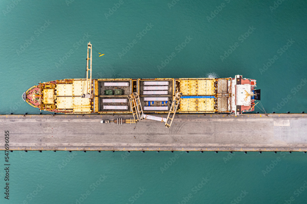 Aerial top view container ship with crane bridge for load container ...