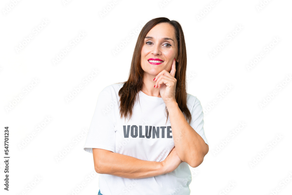 Middle age volunteer woman over isolated chroma key background smiling Middle age volunteer woman over isolated chroma key background smiling