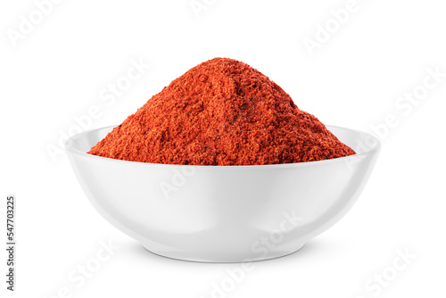 Ground red pepper in white bowl isolated on white. Front view. Fototapeta