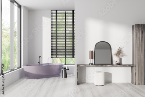 Front view on bright bathroom interior with bathtub  panoramic window