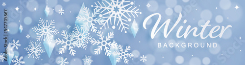 Snowflakes design for winter with snowflakes paper cut style on color background. 
