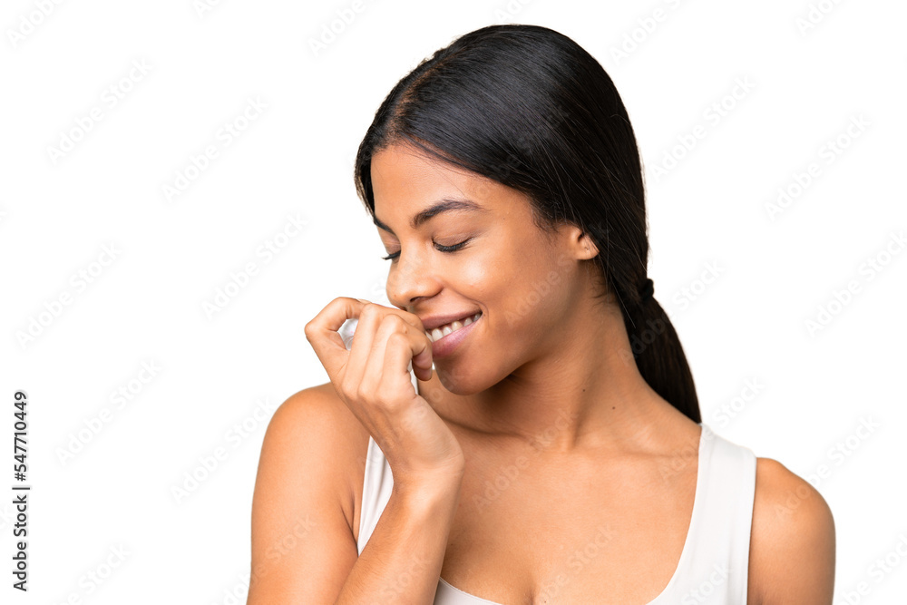 Young woman over over isolated chroma key background with moisturizer and smelling it Young woman over over isolated chroma key background with moisturizer and smelling it