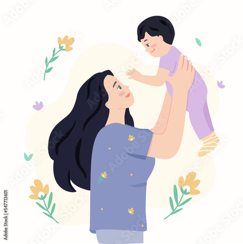 mother holding her child up