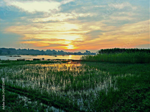 sunrise over the flooded river delta