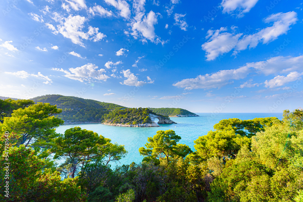 Fototapeta premium Vieste, Italy. View of the bay and the Arch of San Felice near Vieste, on a summer day. September 9, 2022.