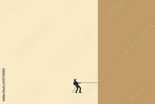 businessman pull the wall with the rope. concept of strength, success, challenge and pressure.