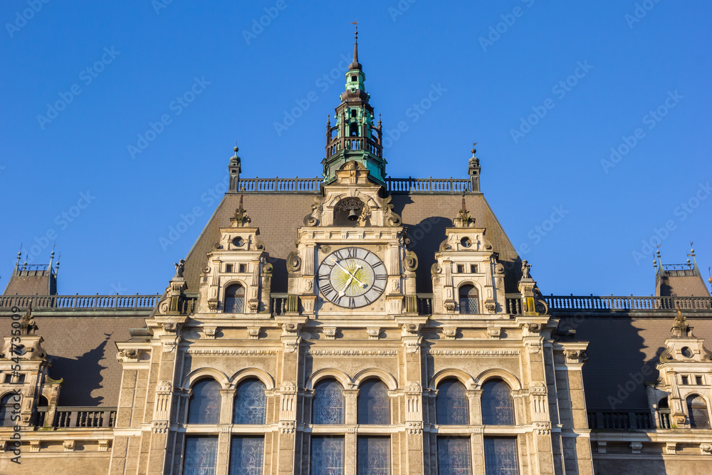 Clock on the facade of the historic town hall in Liberec, Czech Republic