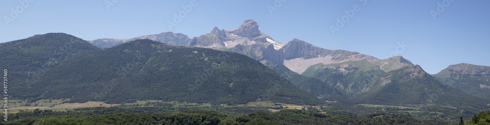 Naklejka premium View over the mountains with blue sky