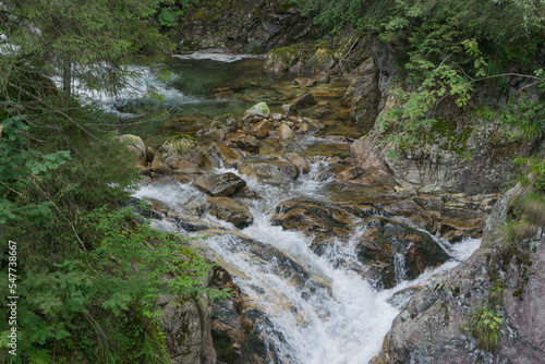 Tatra Mountains. View of the mountain river, waterfall in the mountains