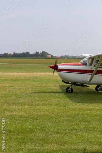 a small airplane parked on the airport