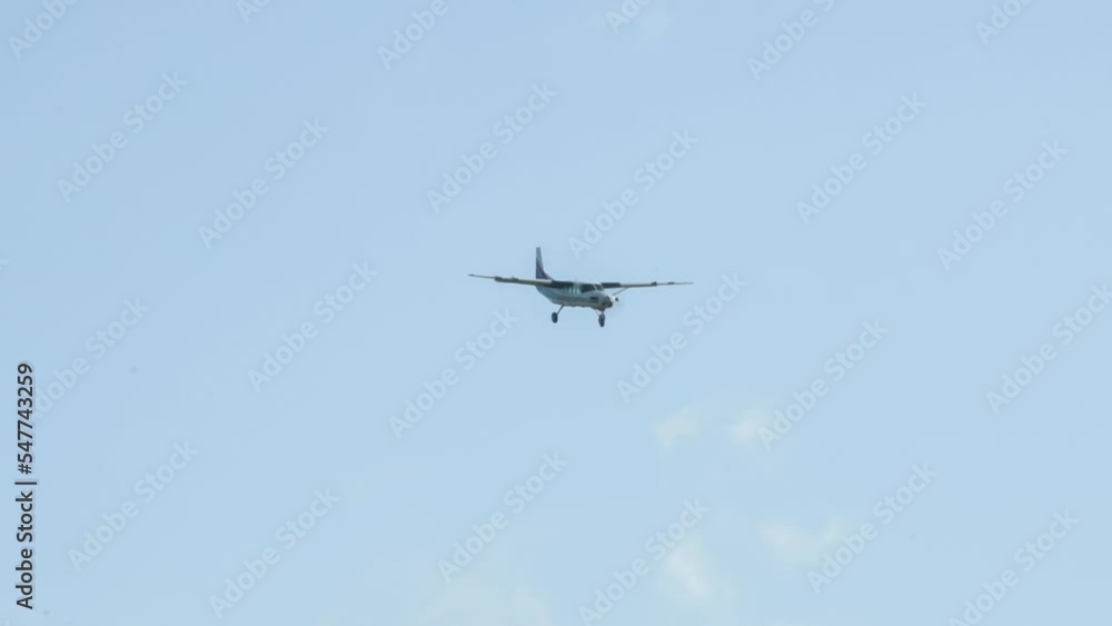 Cessna 208b Grand Caravan G-BZAH light aircraft descending to land in a strong crosswind, Wilts UK Cessna 208b Grand Caravan G-BZAH light aircraft descending to land in a strong crosswind, Wilts UK