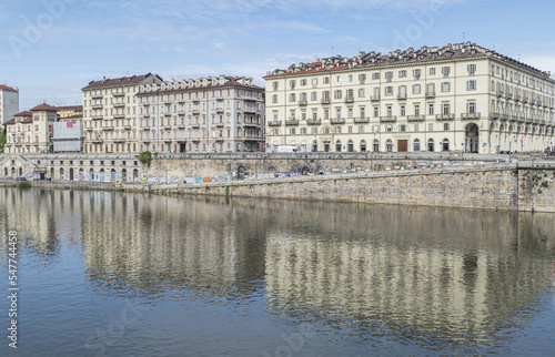 The murazzi of Turin with the palaces that are reflected in the water of the river Po © Alessio