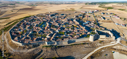 Aerial view of the Spanish medieval town of Urueña in Valladolid, with its famous walls in the foreground. photo