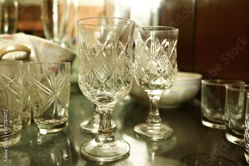 photo - Shot glass and Wine glass with a pattern - in close-up with a blurred background