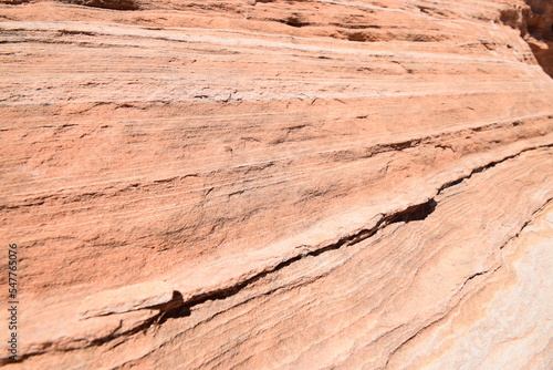 Close-up of red sandstone formation, pattern shaped by erosion in the desert