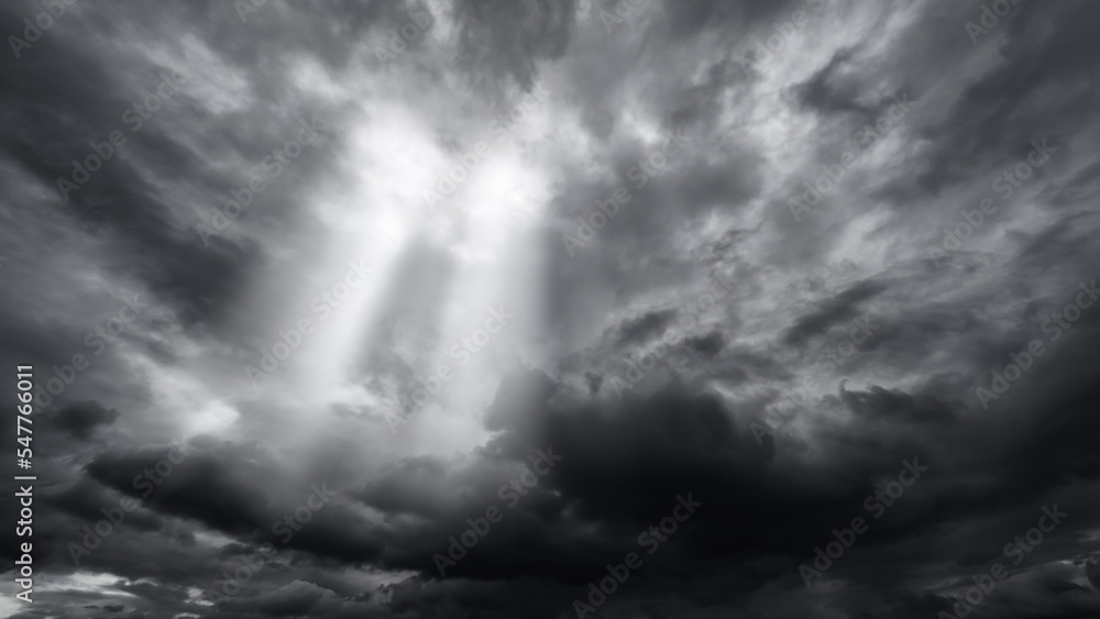 dark dramatic sky with black stormy clouds before rain or snow as abstract background, extreme weather, the sun shines through the clouds, high contrast photo dark dramatic sky with black stormy clouds before rain or snow as abstract background, extreme weather, the sun shines through the clouds, high contrast photo