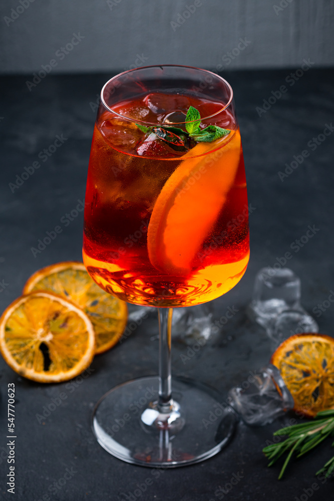 Cocktail Aperol Syringe of liquor, dry wine, sparkling water, orange